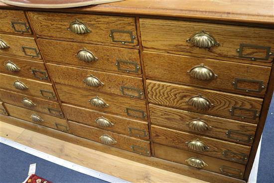 A late Victorian pine bank of forty two drawer